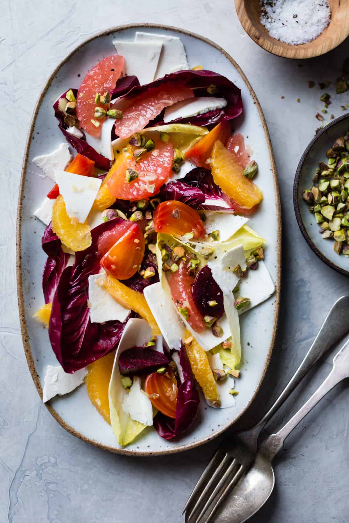 overhead shot of Beet, Citrus, & Chicory Salad with Ricotta Salata and Pistachios