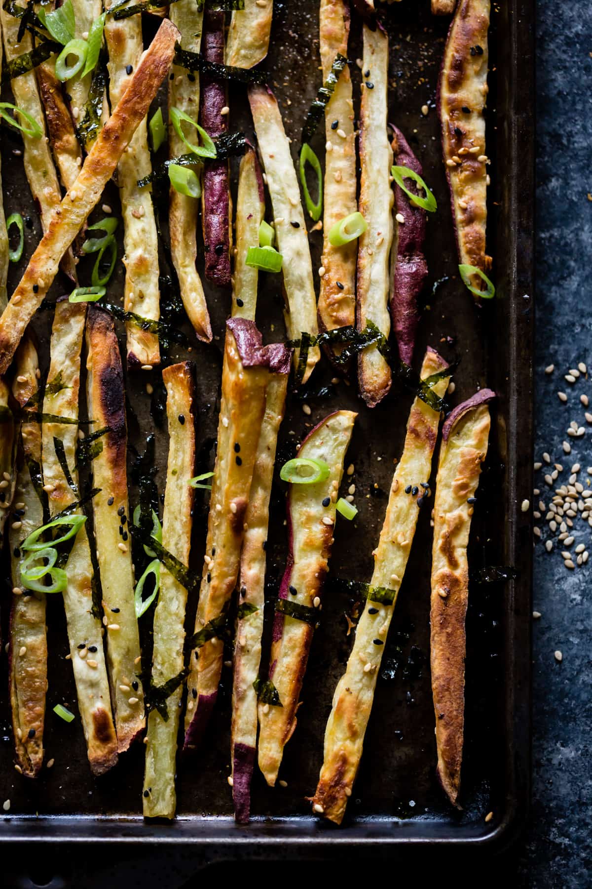 oven tray of crispy Japanese Sweet Potato Oven Fries with Wasabi Aioli