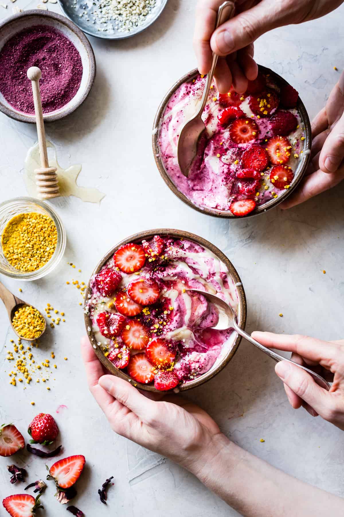spoons in bowls Hibiscus Berry Smoothie Bowls