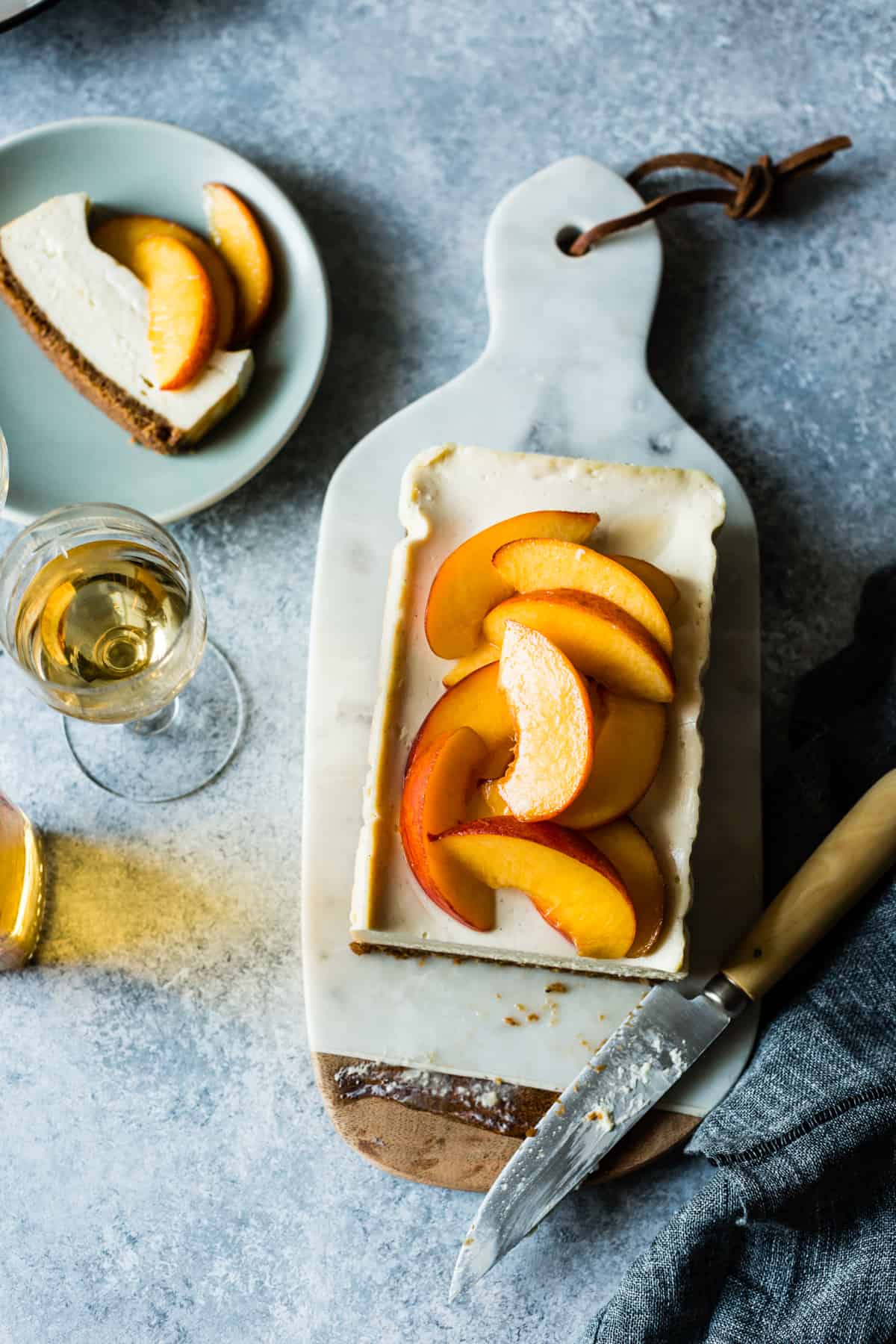 Small Batch Cheesecake with Elderflower Peaches on board