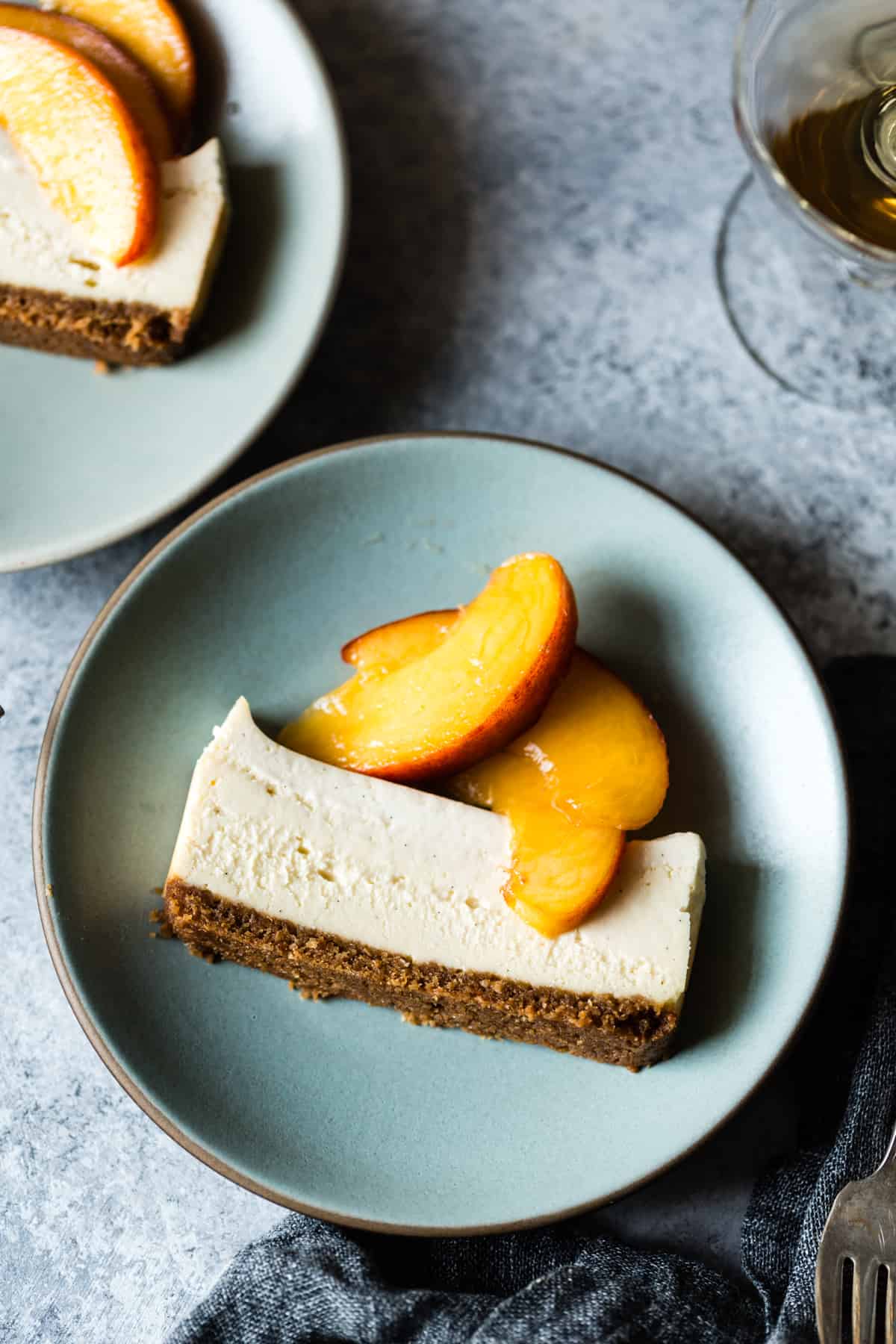 slice of delicious Small Batch Cheesecake with Elderflower Peaches