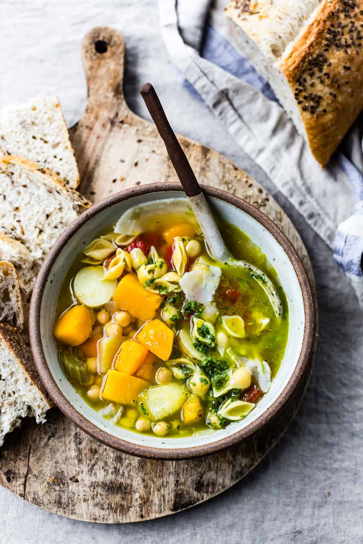 delicious bowl of Vegetarian Minestrone Soup with Chickpeas & Lemon Parsley Oil