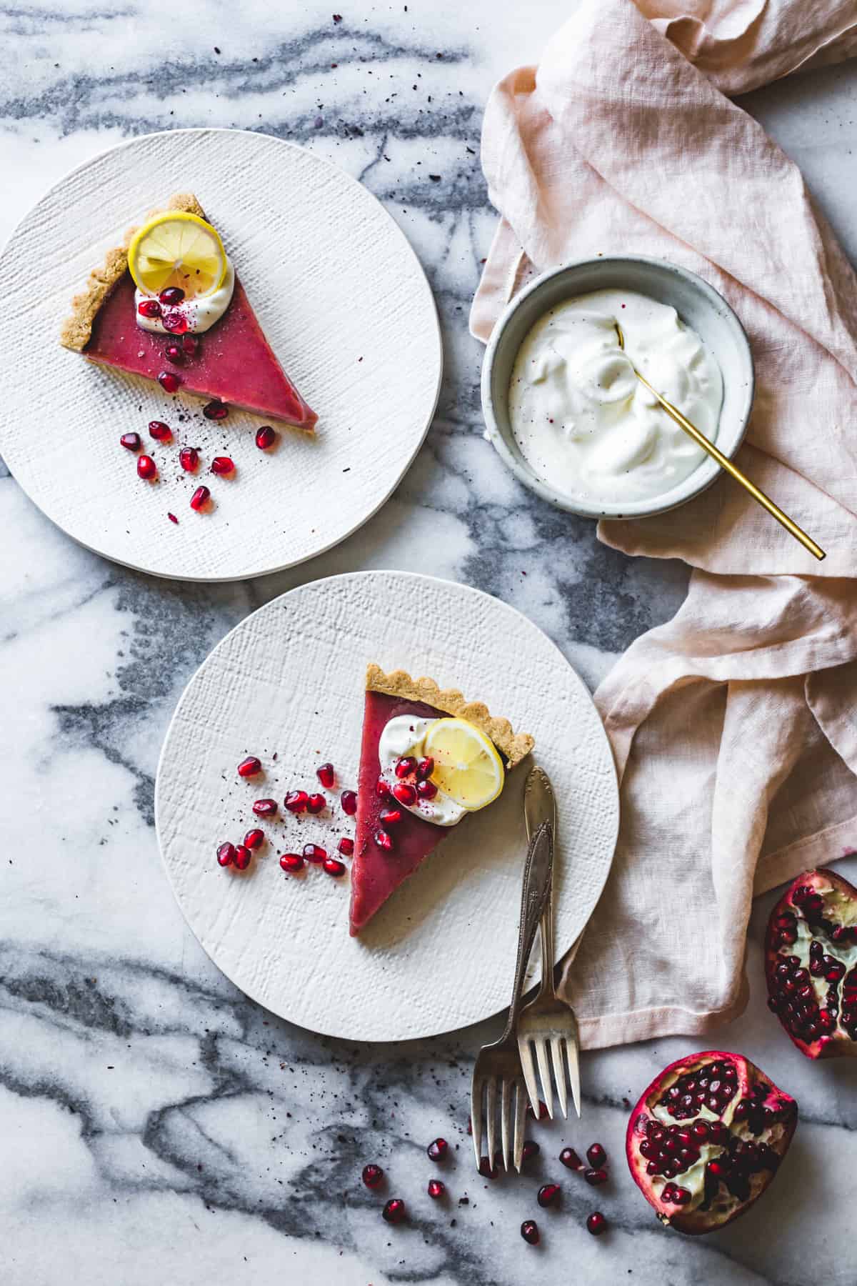 two slices Pomegranate Tart with Hibiscus, Lemon, and Almond Flour Crust {gluten-free}