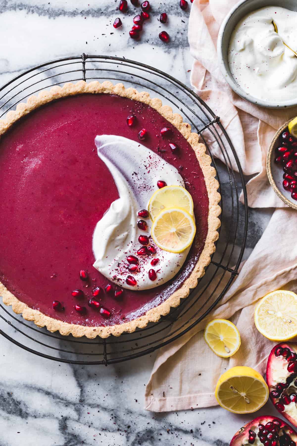 Pomegranate Tart with Hibiscus, Lemon, and Almond Flour Crust {gluten-free} on plate