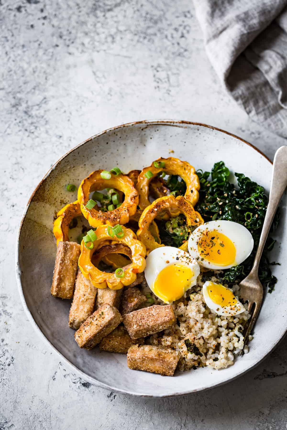 bright Fall Brown Rice Veggie Bowls with Crispy Tofu, Roasted Squash, and Miso Butter