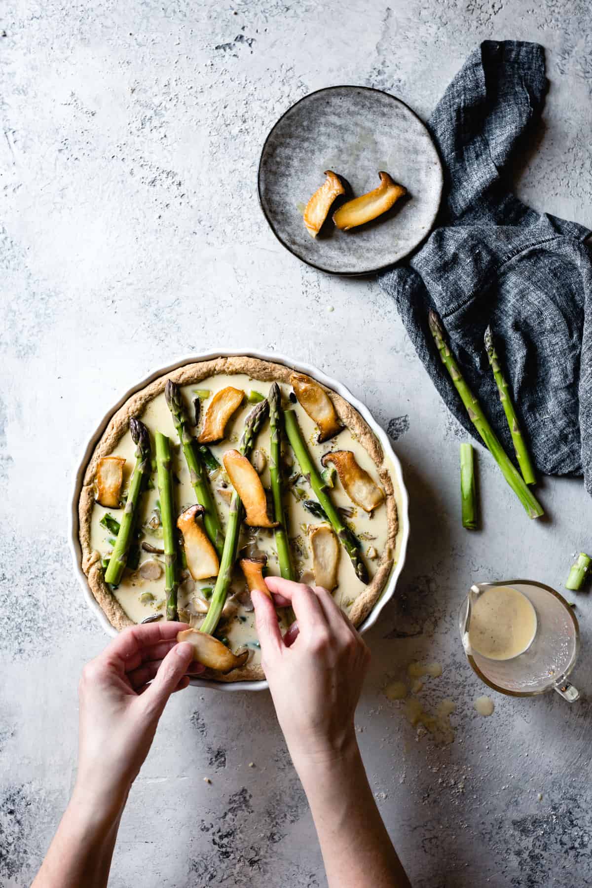 laying mushrooms on quiche