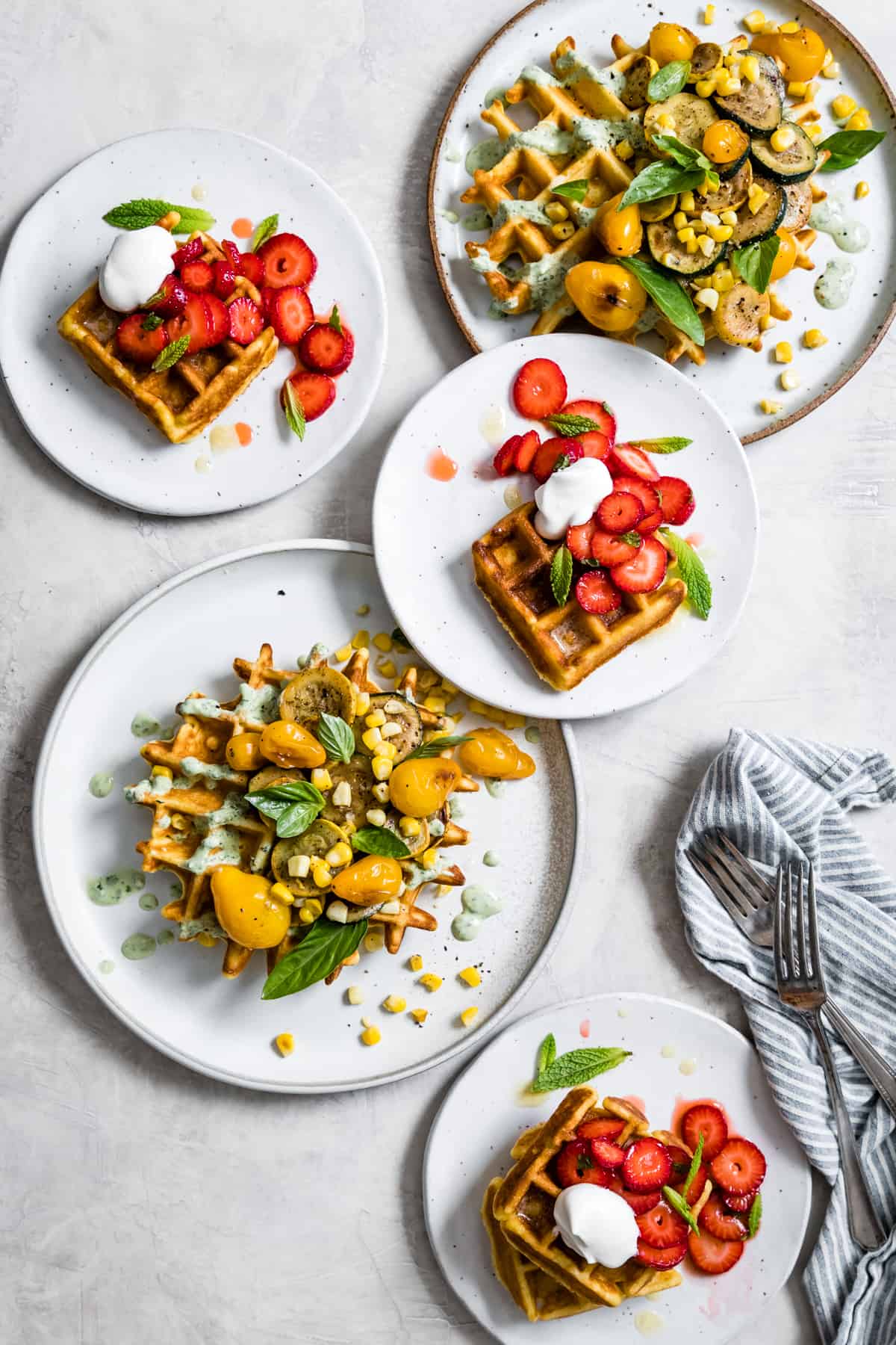 plates of Corn Flour Waffles with Whipped Honey Ghee and Berries {gluten-free}