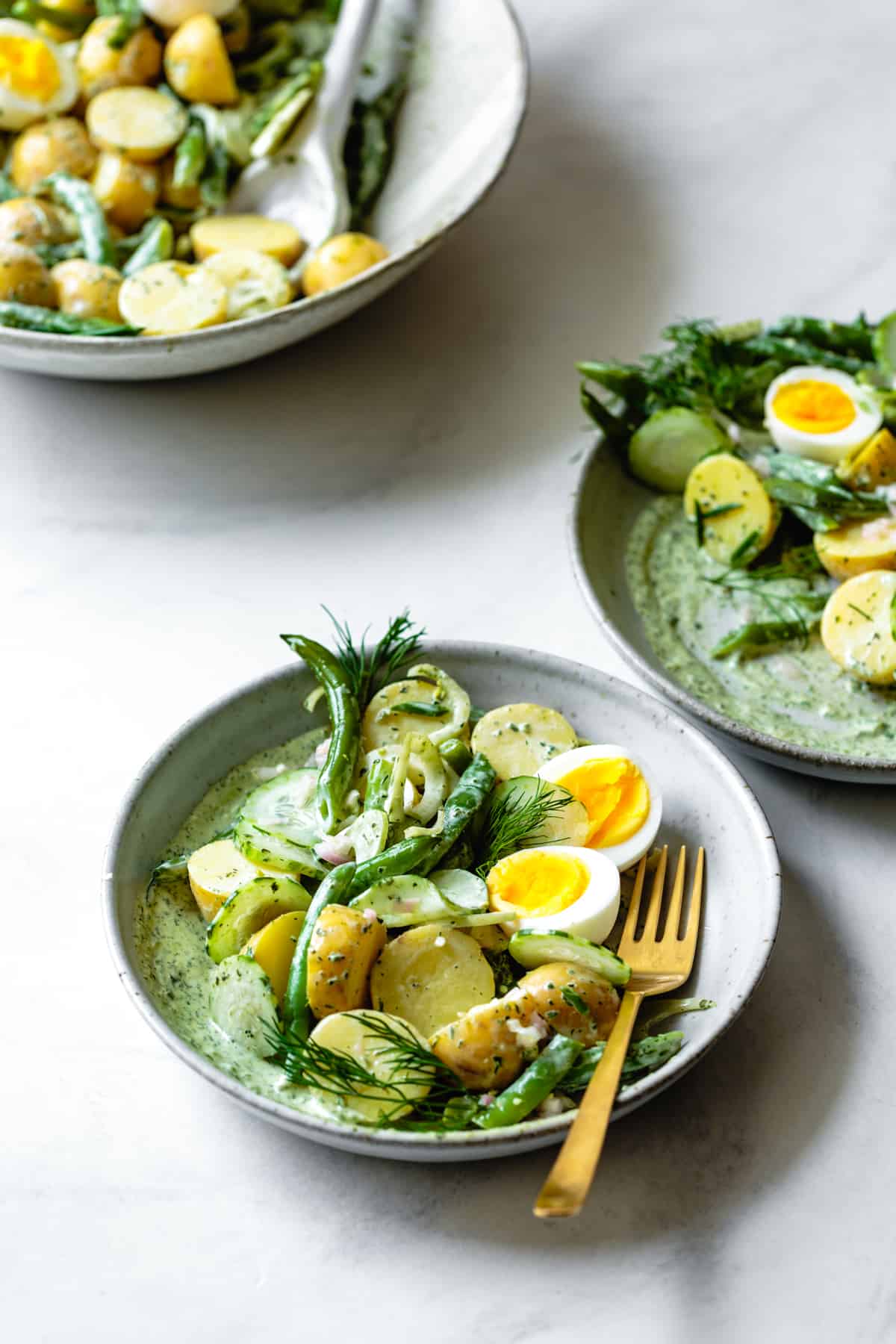 bowls of Green Goddess Potato Salad