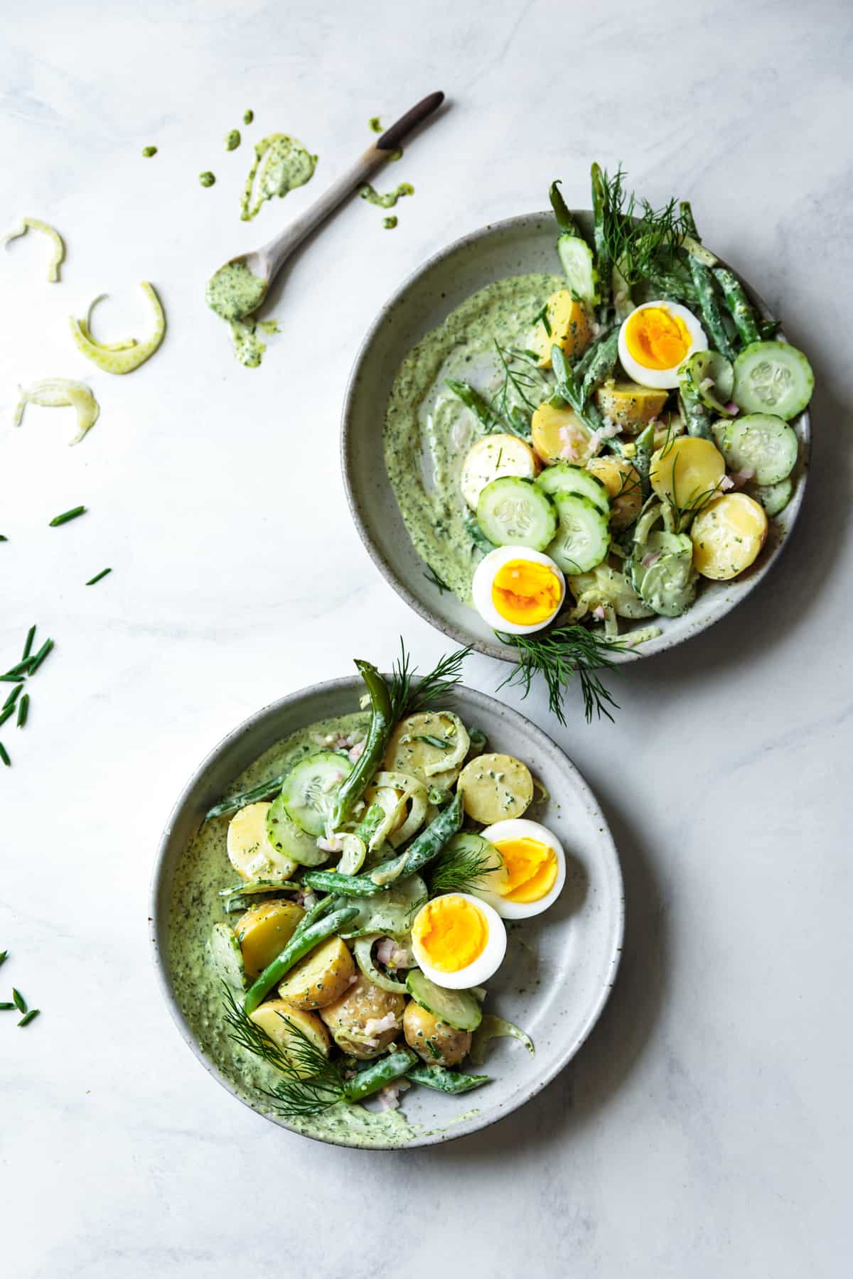 two bowls Green Goddess Potato Salad