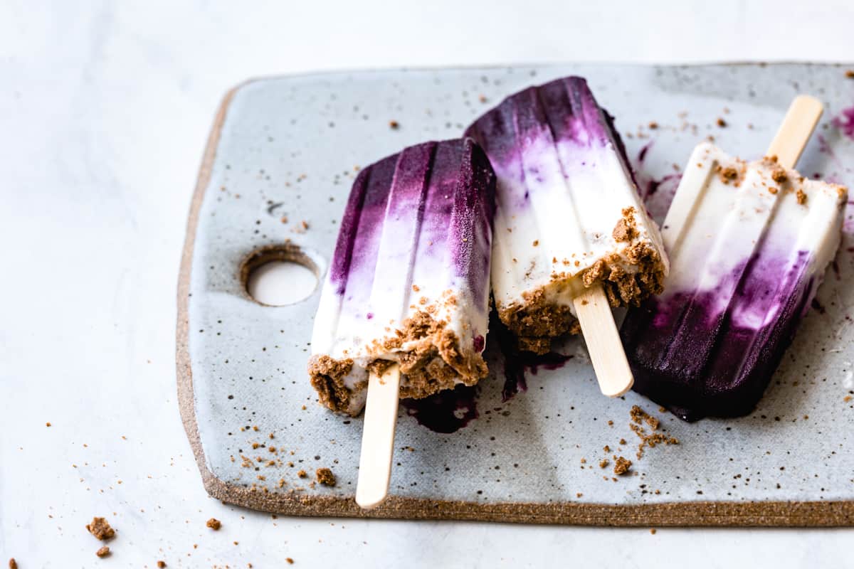 stack of Blueberry Chèvre Cheesecake Popsicles