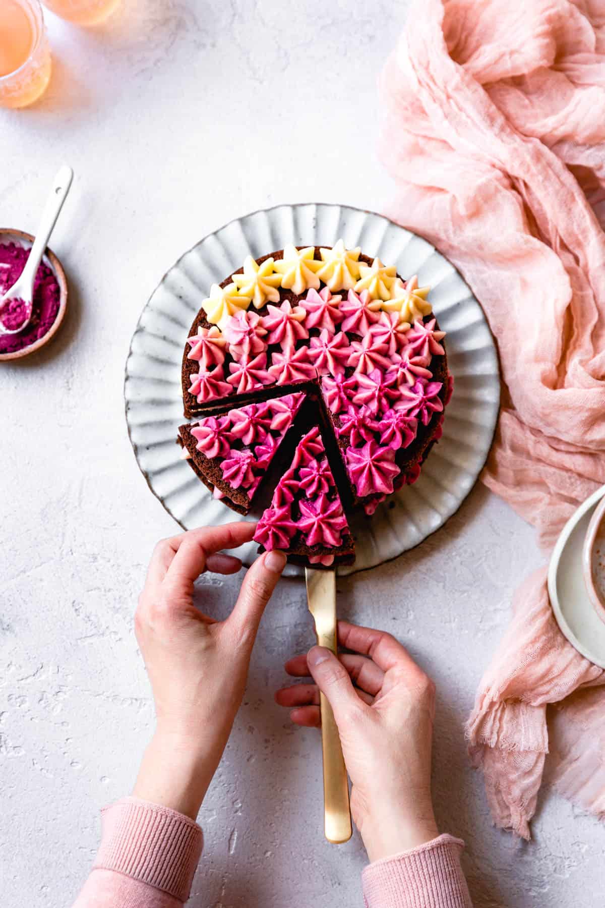 Gluten Free Red Velvet Cake with Cream Cheese Frosting being served 