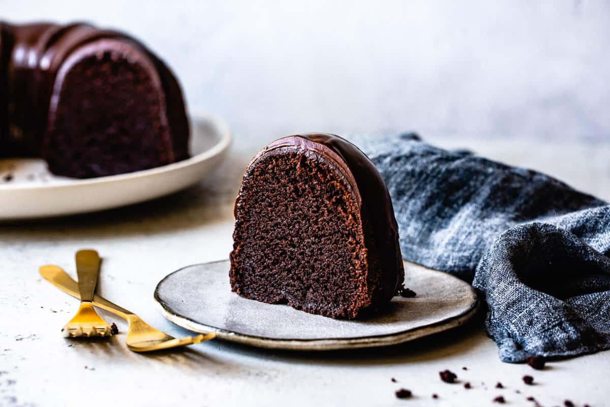 slice of Gluten Free Chocolate Bundt Cake Recipe on a plate