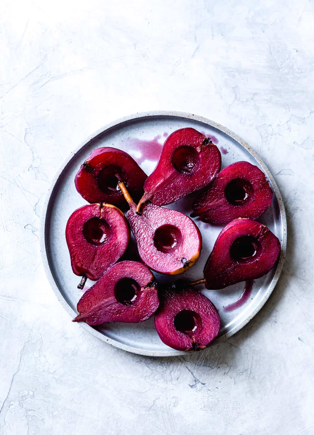 poached pears on plate 