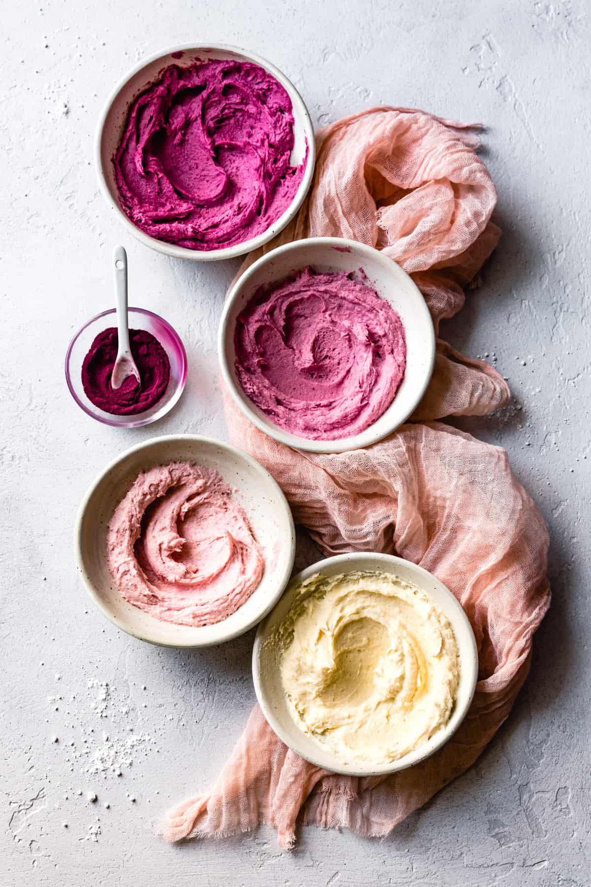 bowls of cream cheese frosting