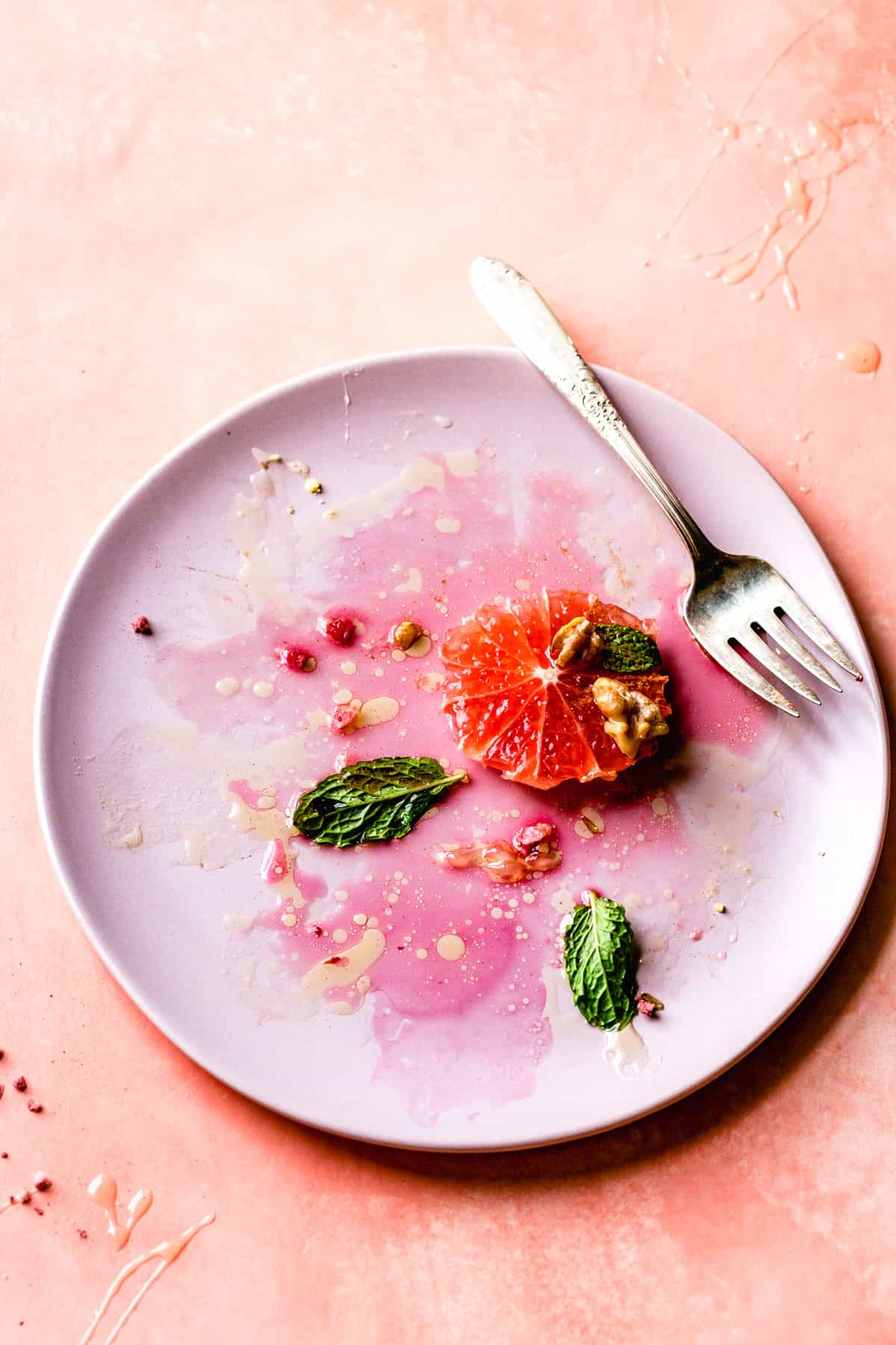 Winter Citrus Salad with Walnuts, Dates & Rose with fork