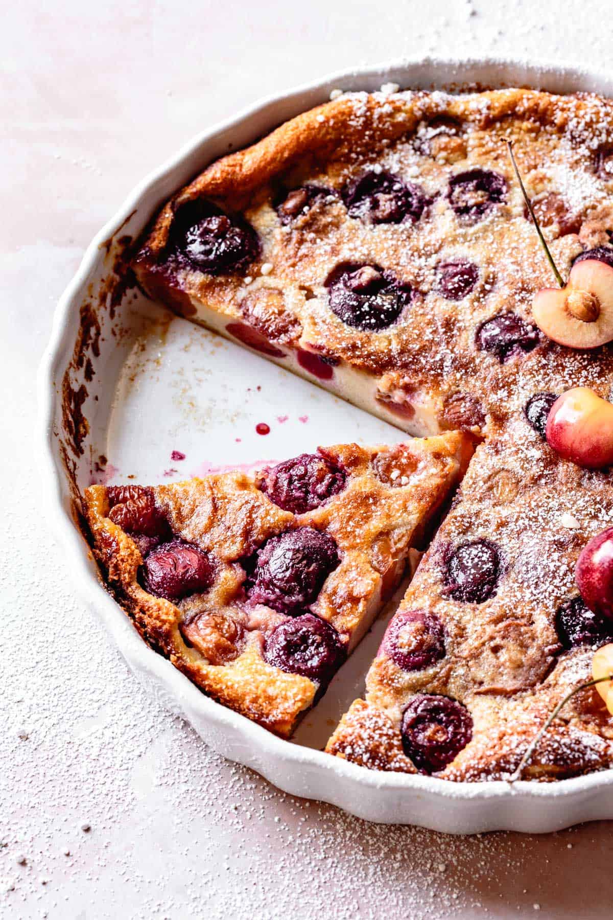 Gluten-Free Cherry Clafoutis, sliced in pan (close up)