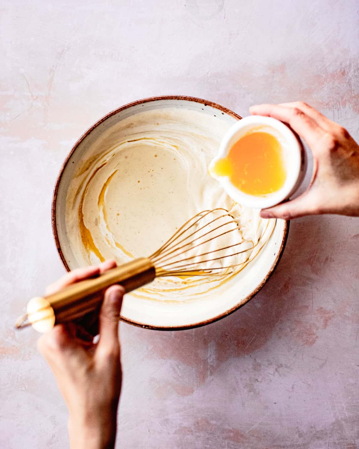 whisking butter into gluten free clafoutis batter