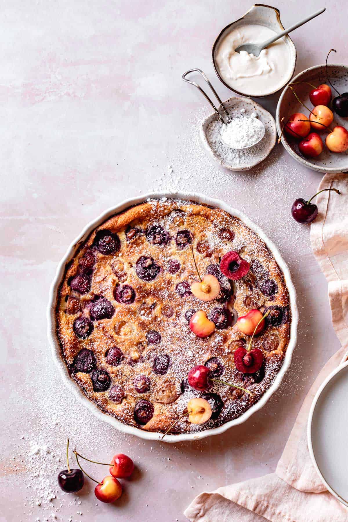 Gluten-Free Cherry Clafoutis recipe, after baking, sprinkled with powdered sugar