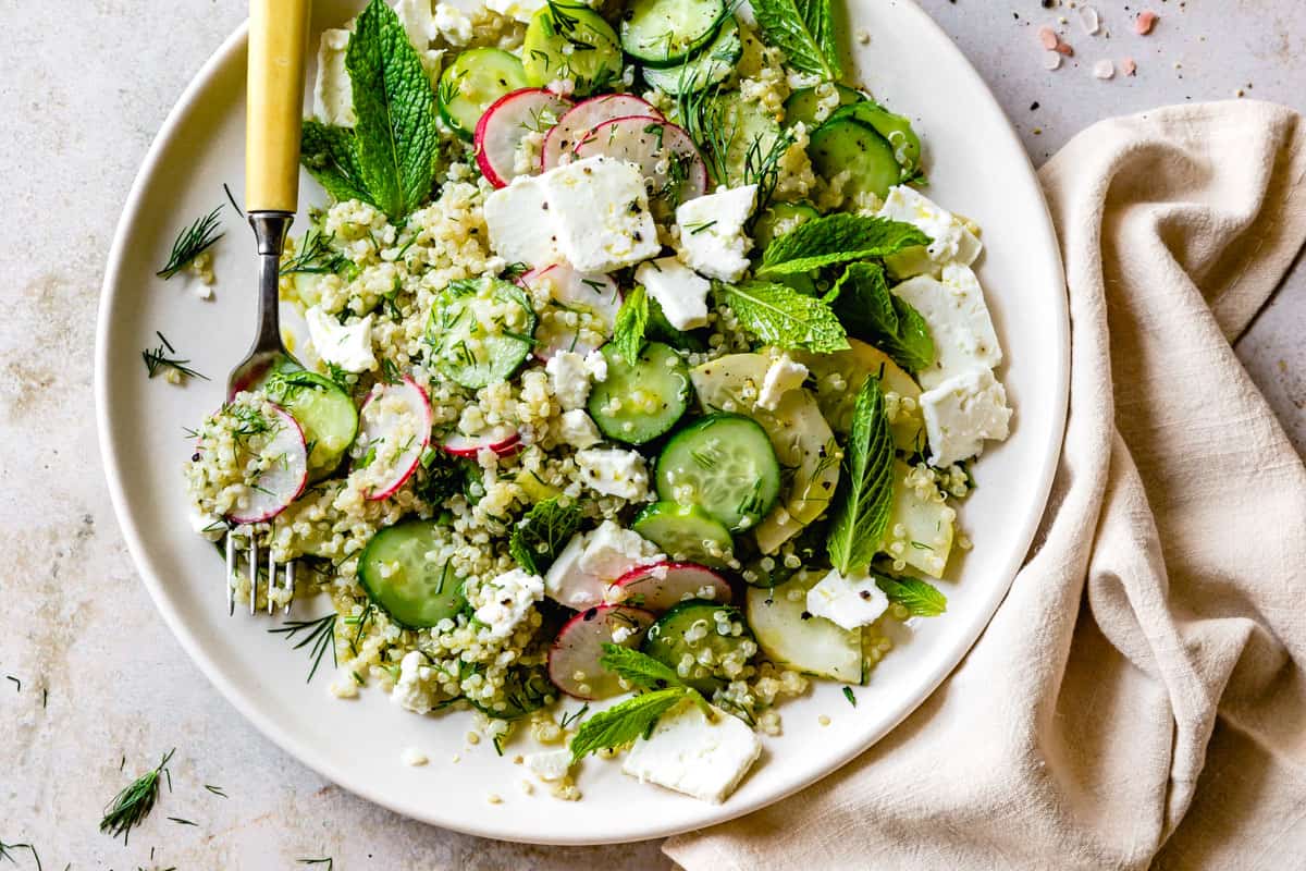Close up of Quinoa Cucumber Salad with Feta, Dill & Mint on a plate