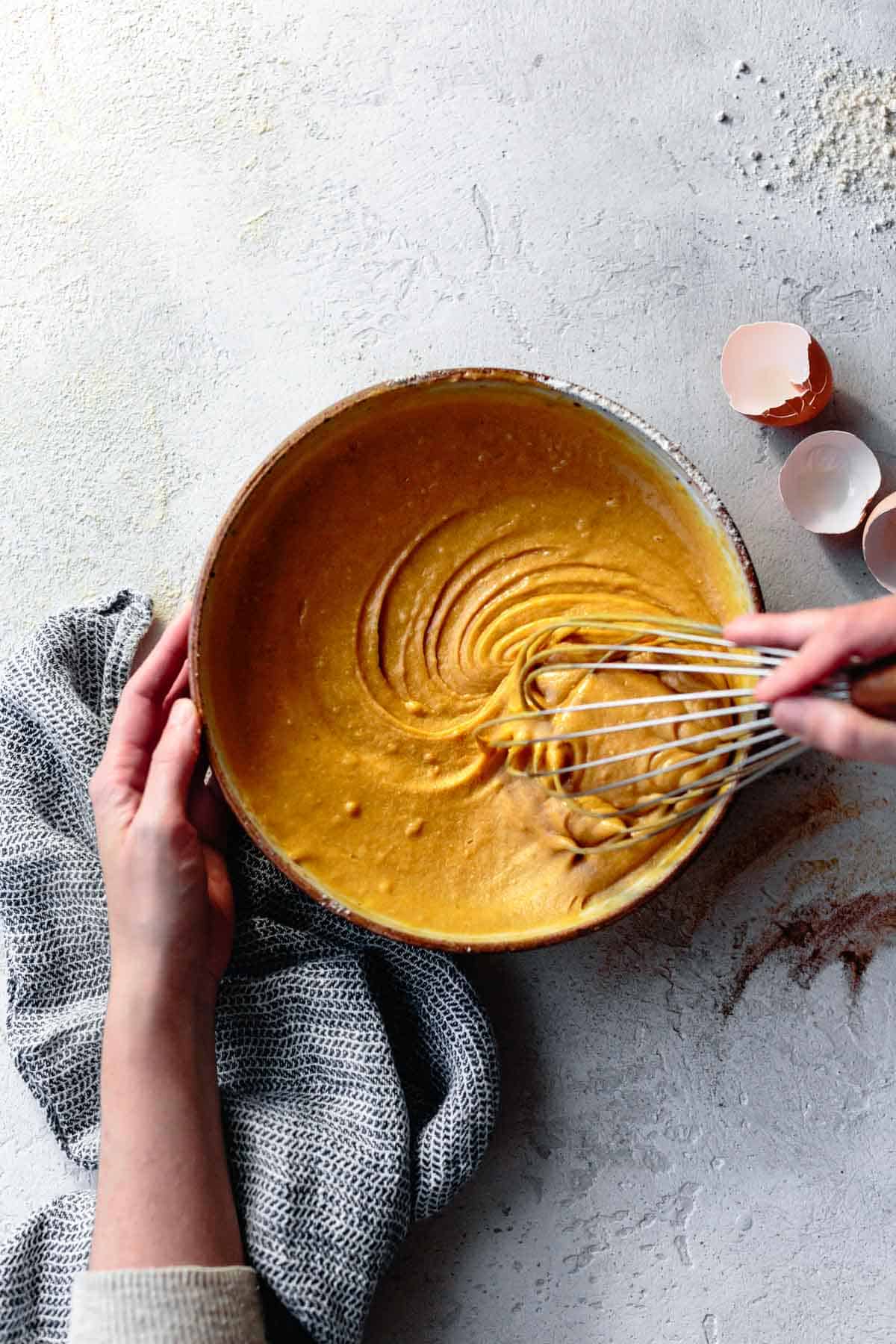 Whisking batter for homemade pumpkin bread recipe (gluten-free and dairy-free)