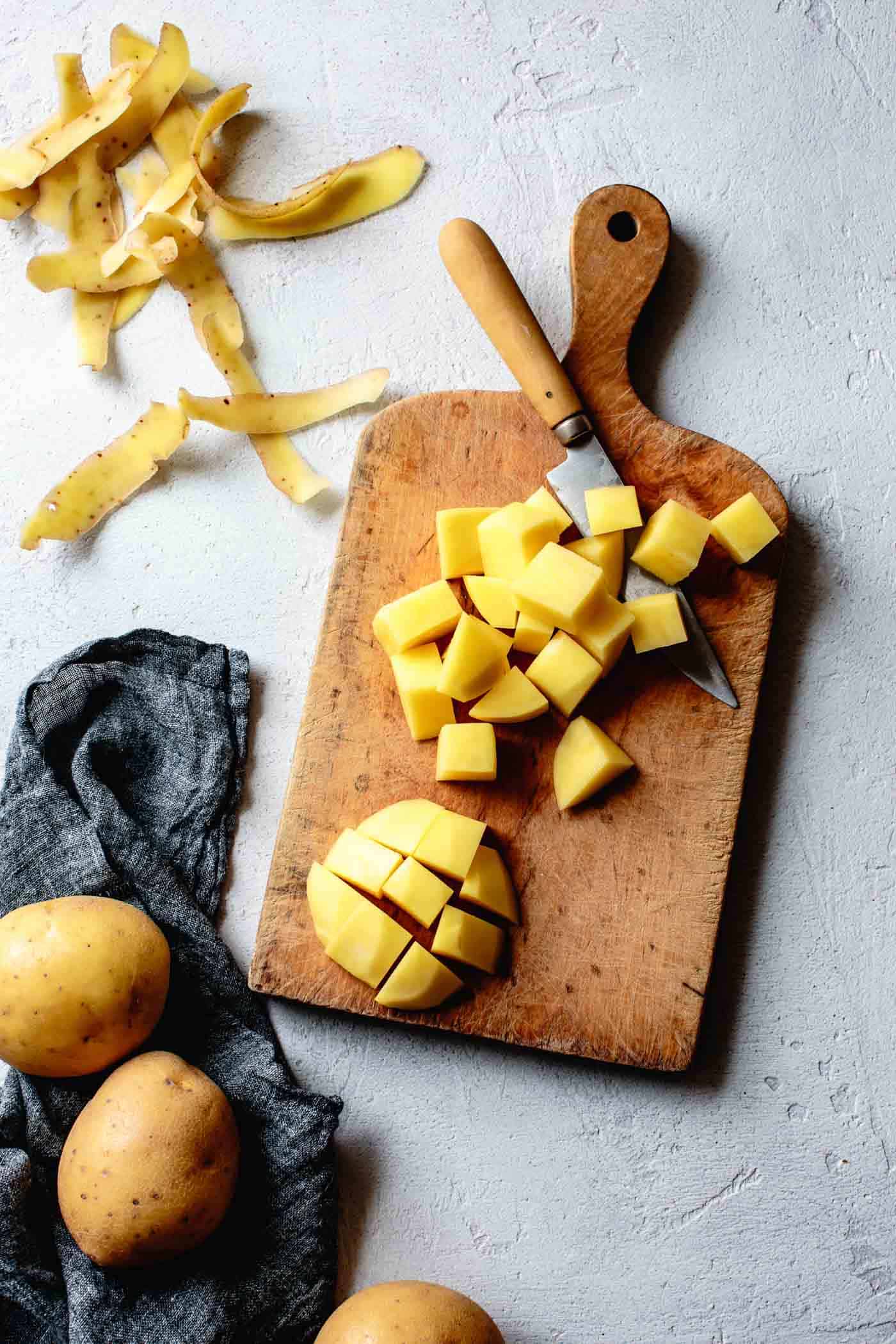 Preparing yellow potatoes for green goddess mashed potatoes