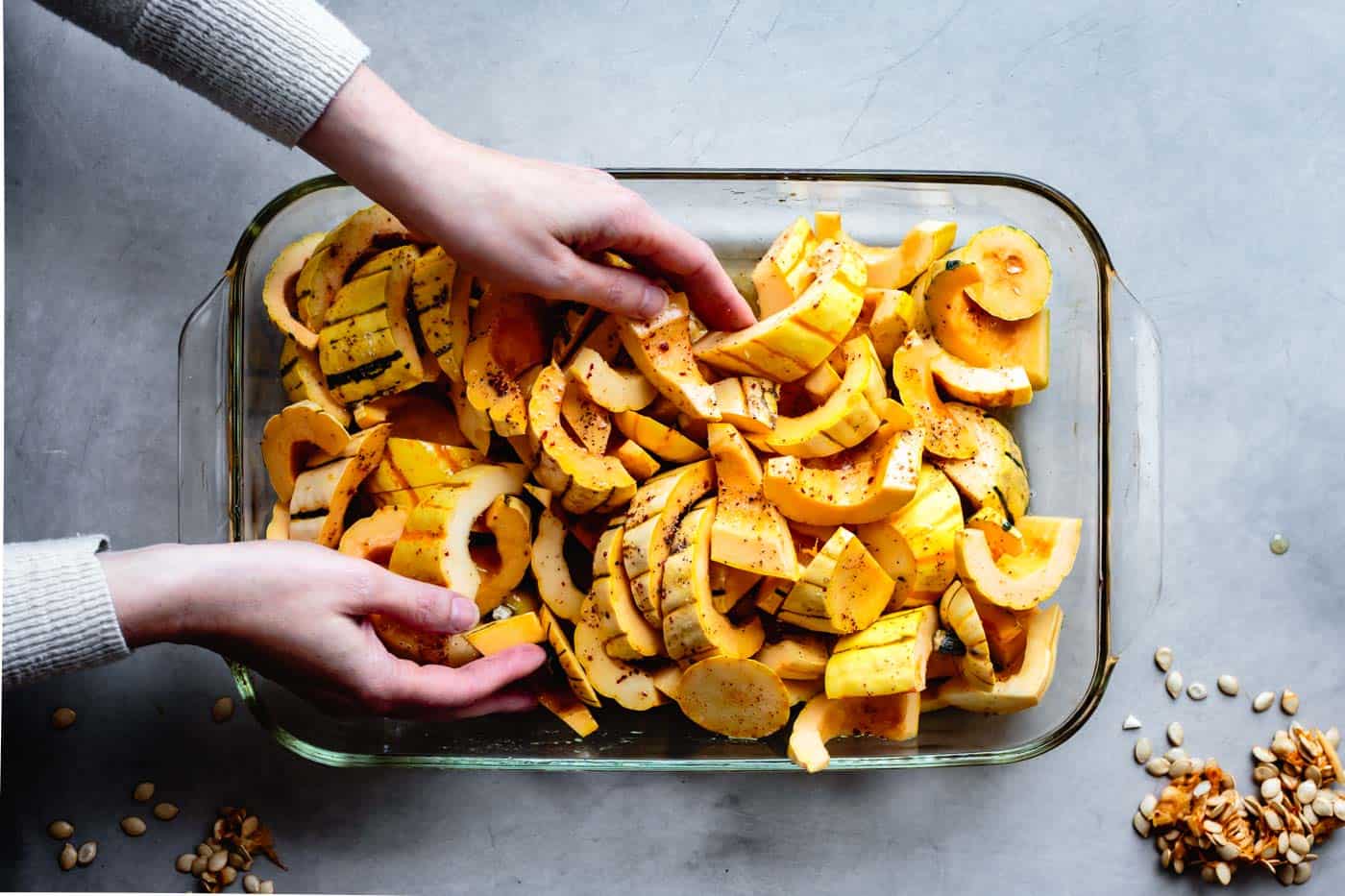 tossing delicata squash with brown butter and spices