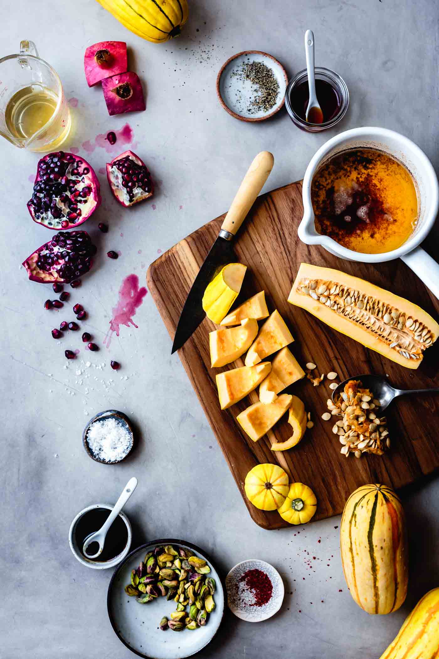 Ingredients for roasted delicata squash recipe with brown butter and pomegranate molasses