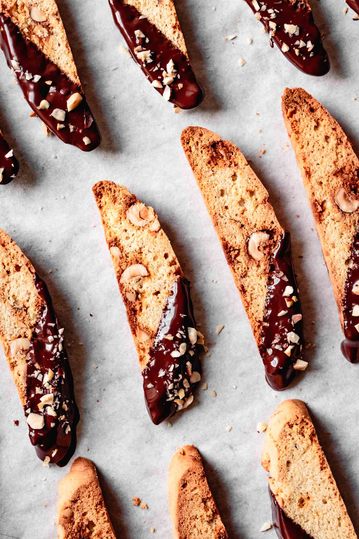 Close-up of Gluten-Free Biscotti with Hazelnuts & Chocolate on a baking sheet