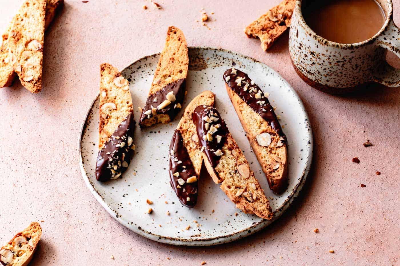 Gluten-Free Almond Biscotti recipe being served on a plate with coffee