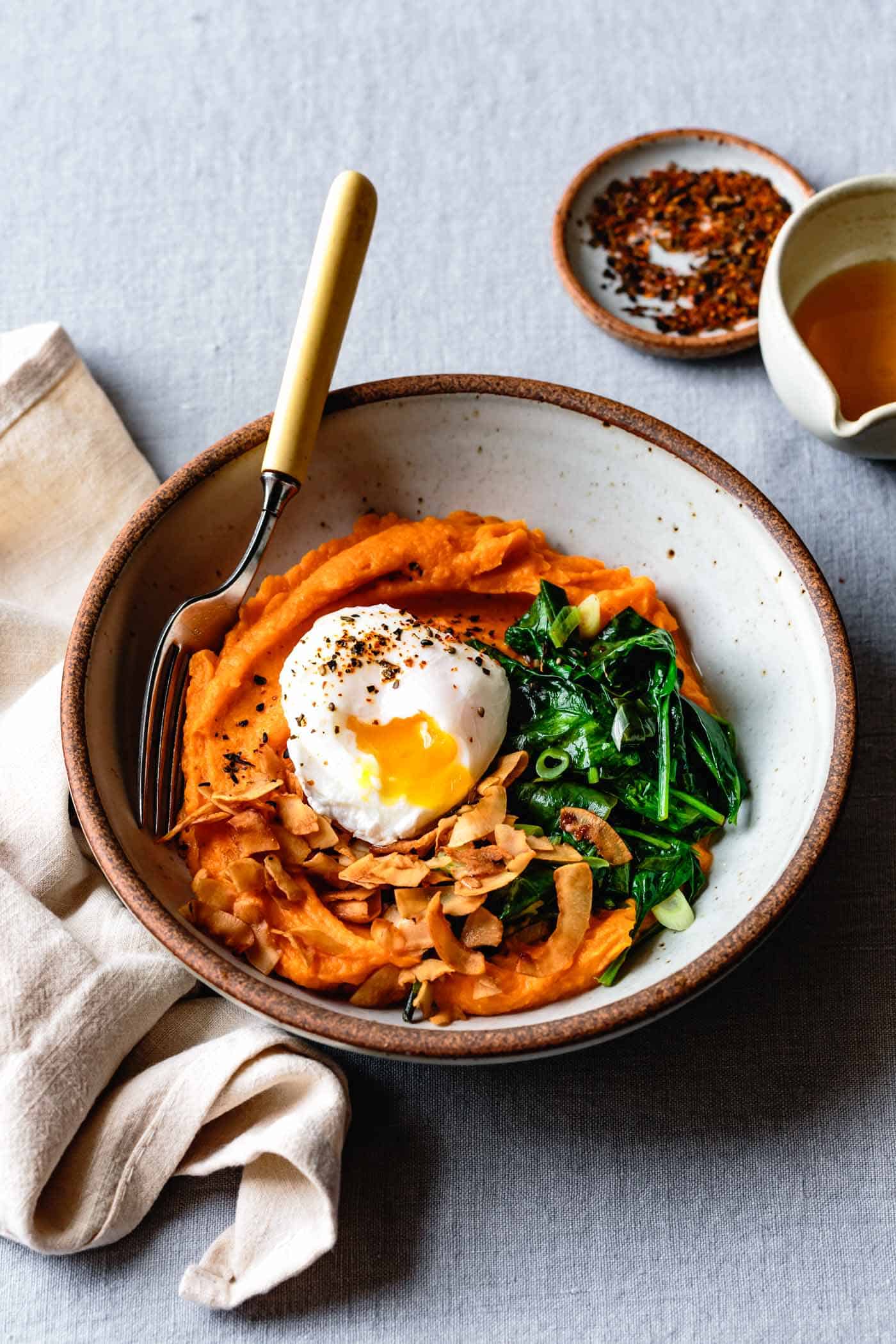 Whipped Sweet Potato Breakfast Bowls with Spinach, Eggs, and Coconut