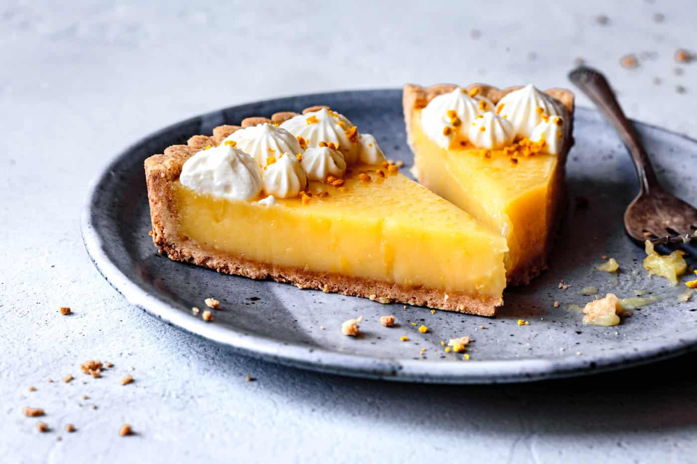 slices of lemon curd tart on a plate