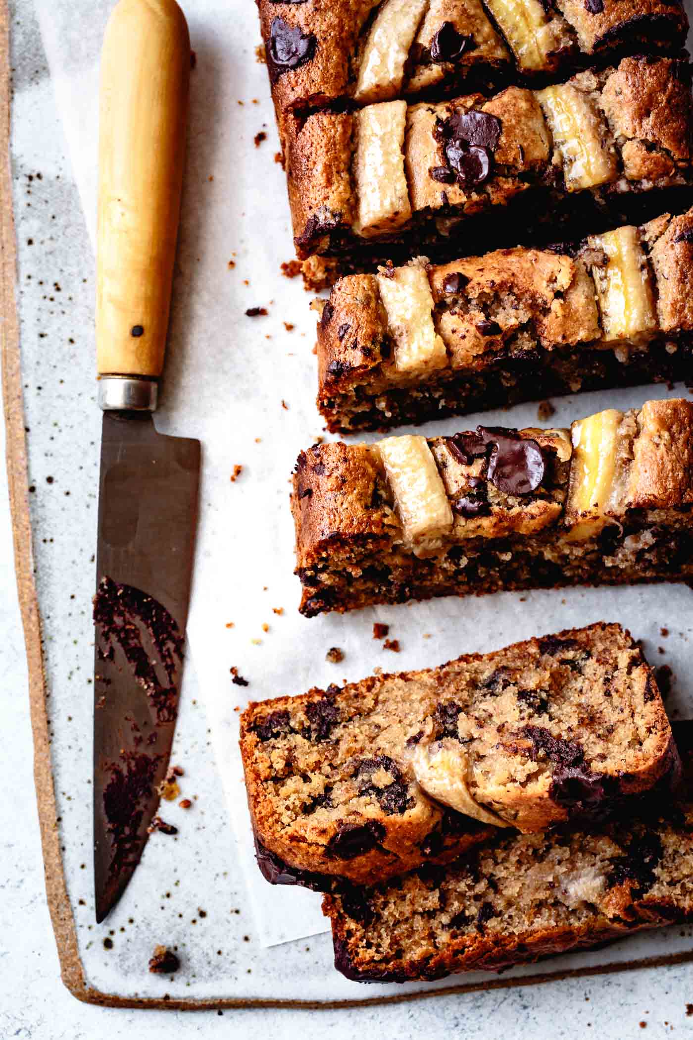 Gluten-free banana bread with almond flour, sliced on a platter