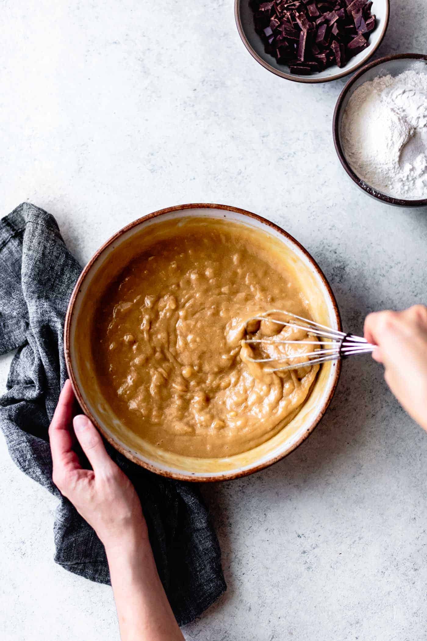 Whisking the batter for vegan paleo banana bread recipe