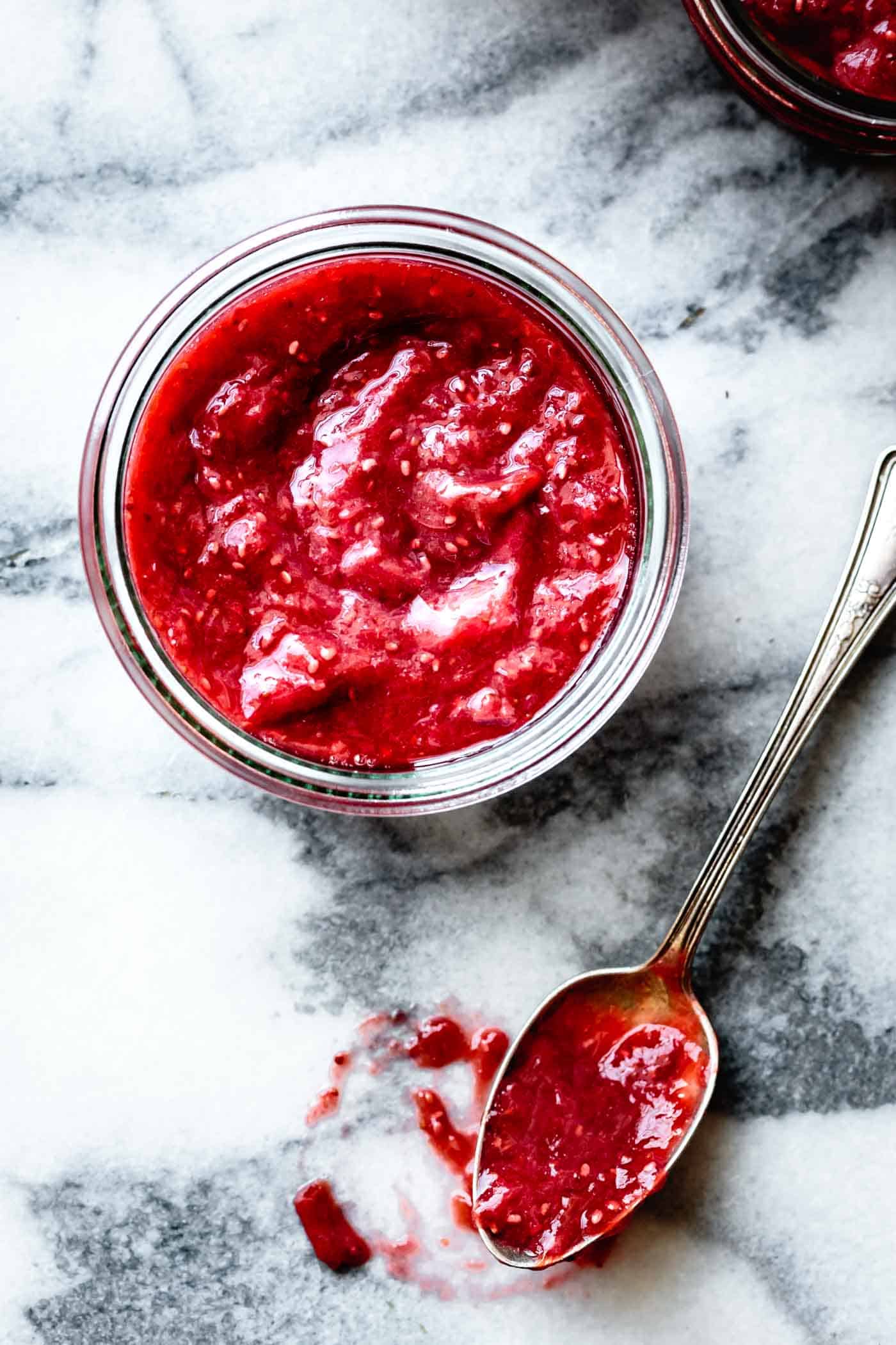 rhubarb and strawberry jam with chia seed and maple in a jar