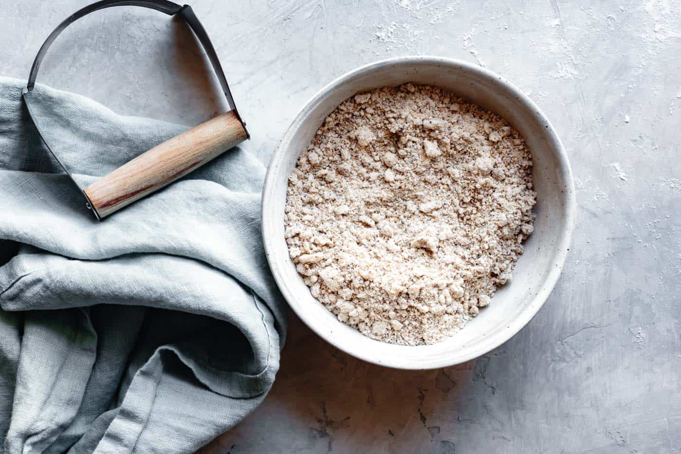 making almond flour biscuits for paleo vegan peach cobbler