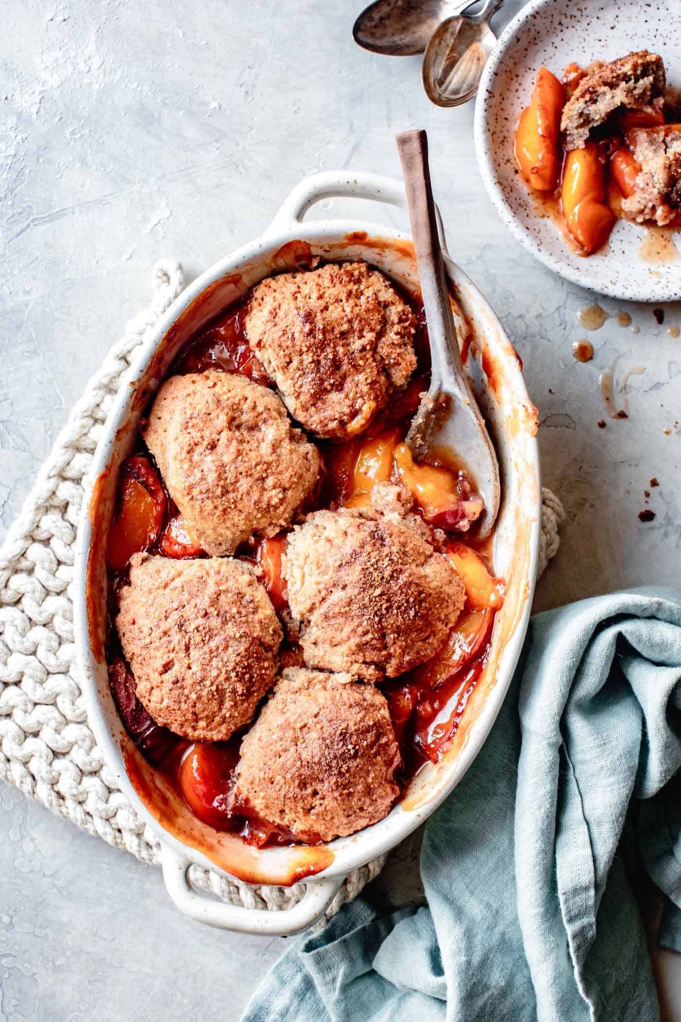 serving up healthy peach cobbler with almond flour