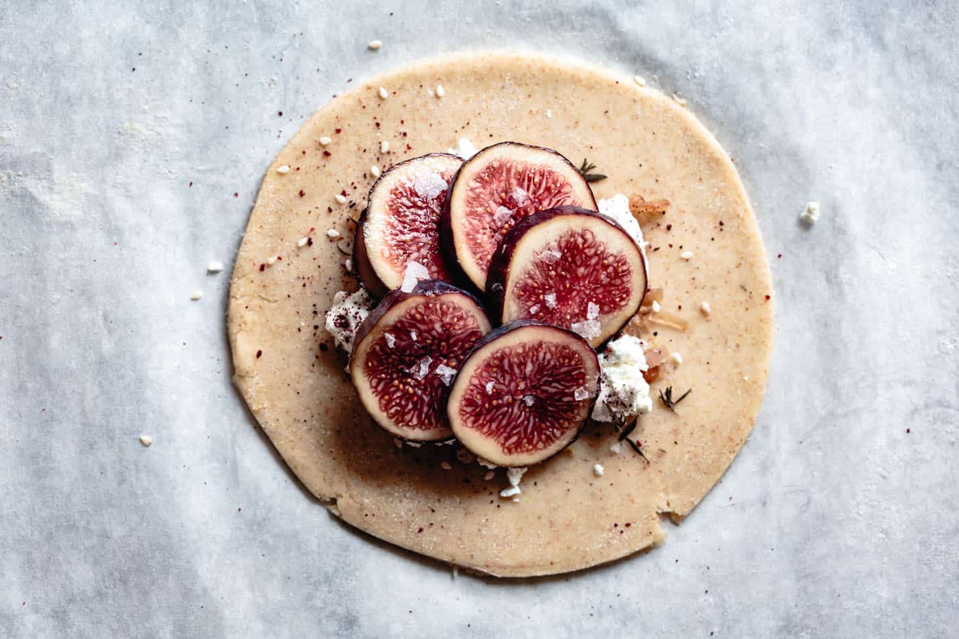 fanning figs over goat cheese for galette recipe