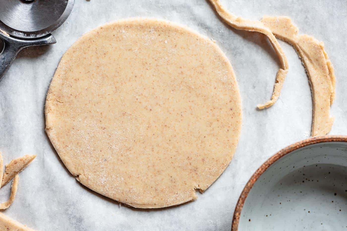 trimming dough rounds for fig galette recipe