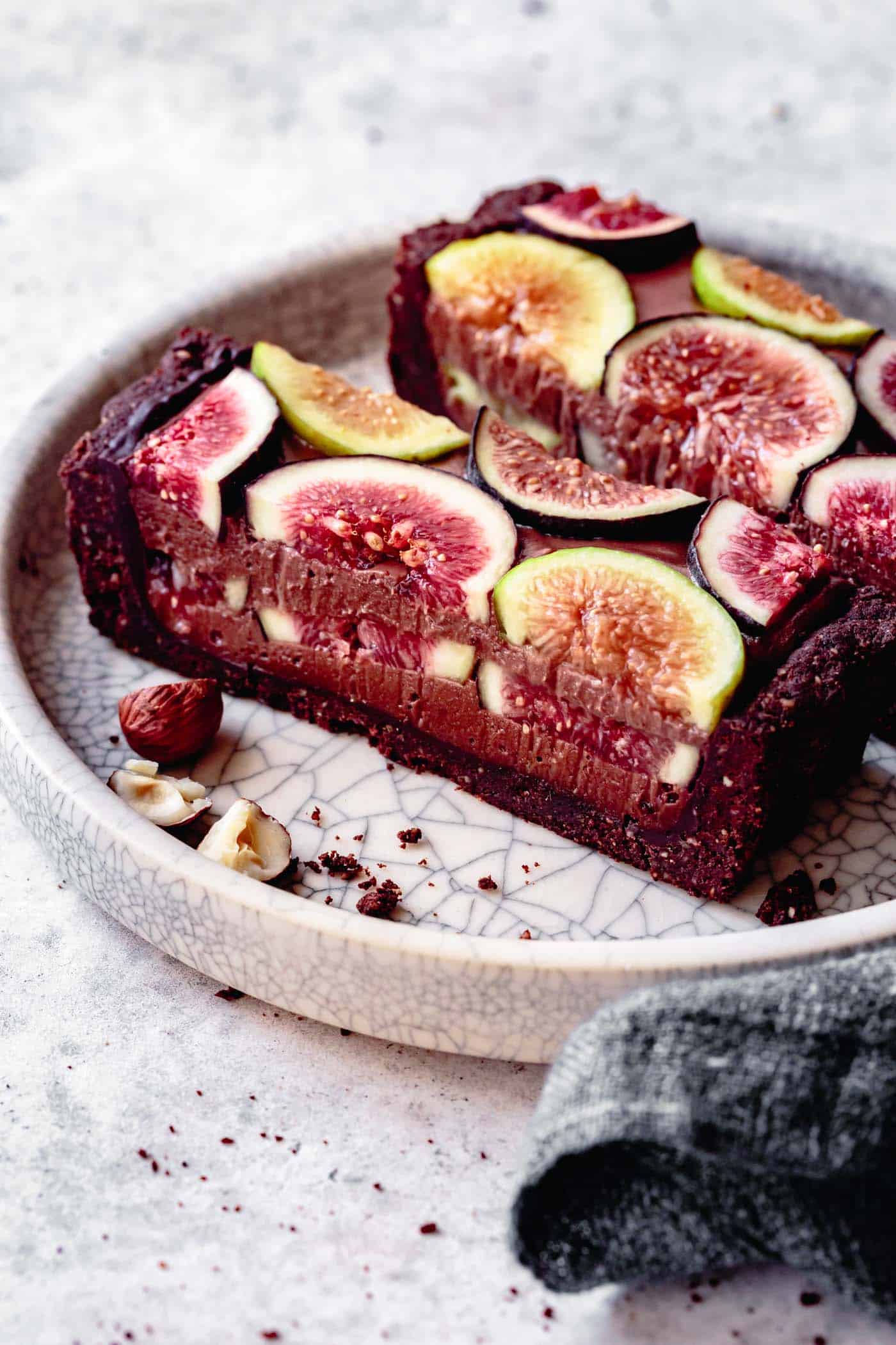 Slices of chocolate fig tart on a plate