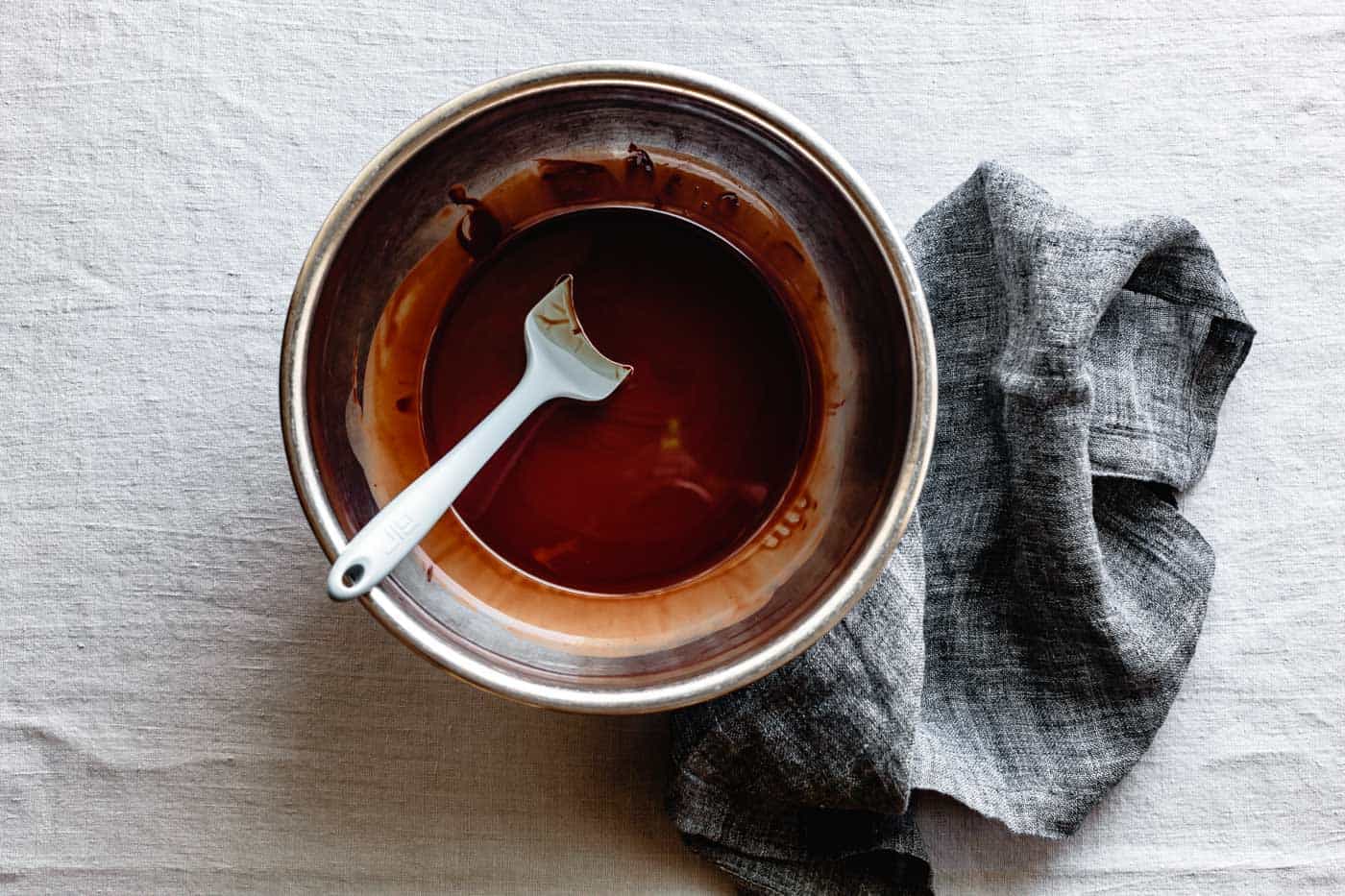 melting chocolate and oil for chocolate olive oil cake recipe