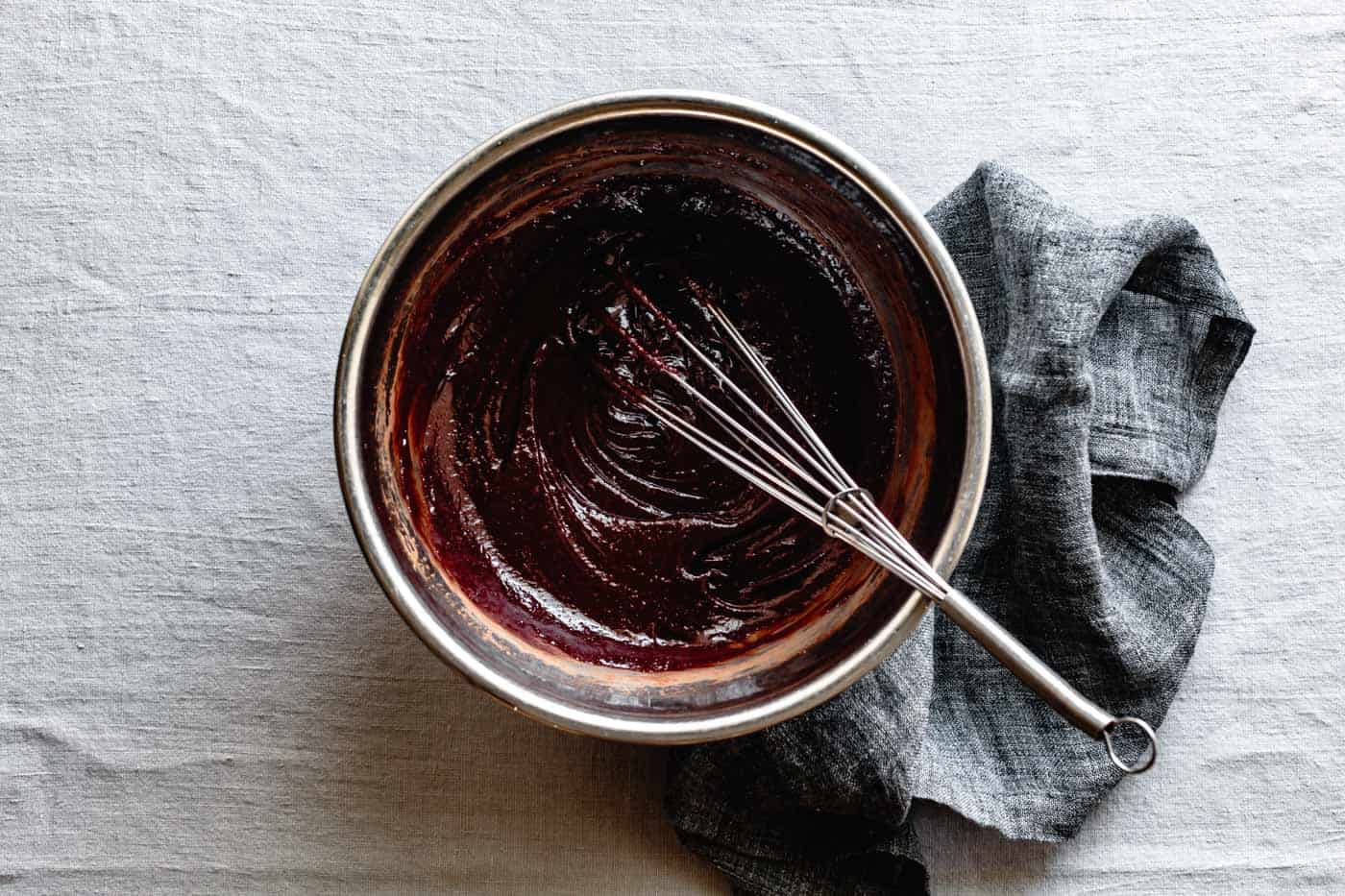 whisking chocolate olive oil cake batter