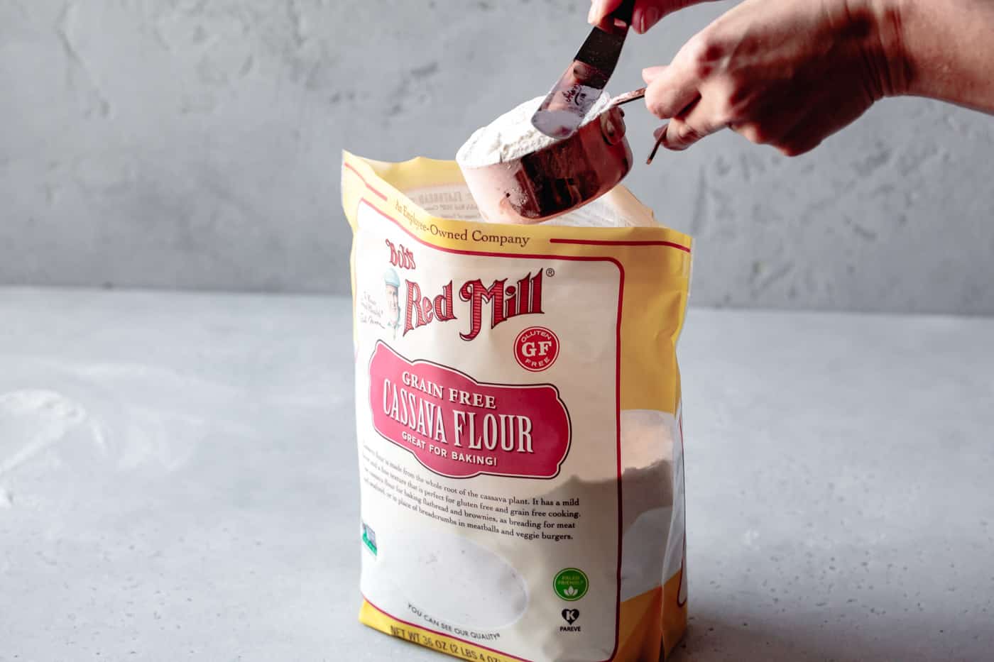 measuring cassava flour for grain-free pie crust recipe