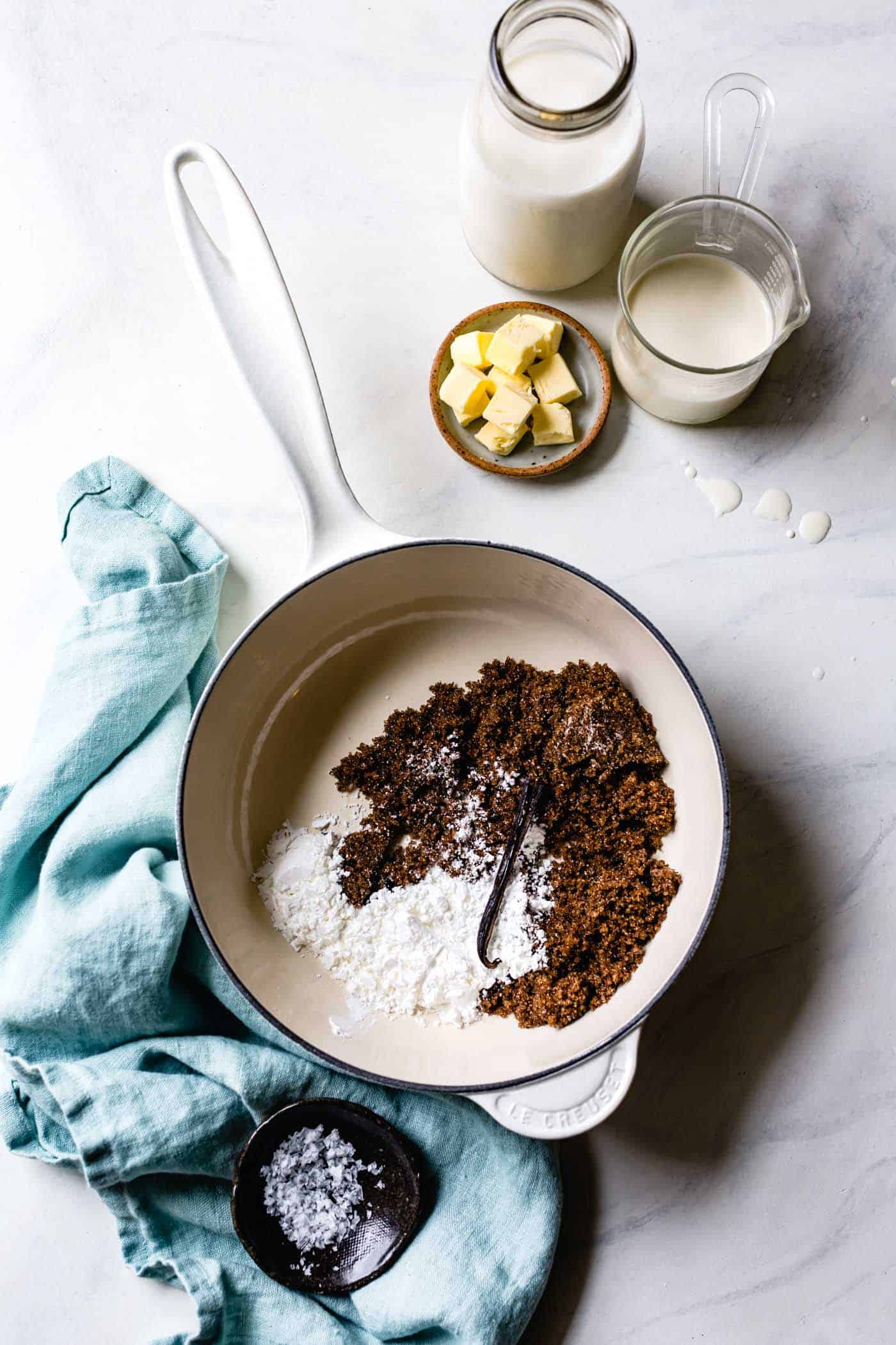 pudding ingredients on a marble surface