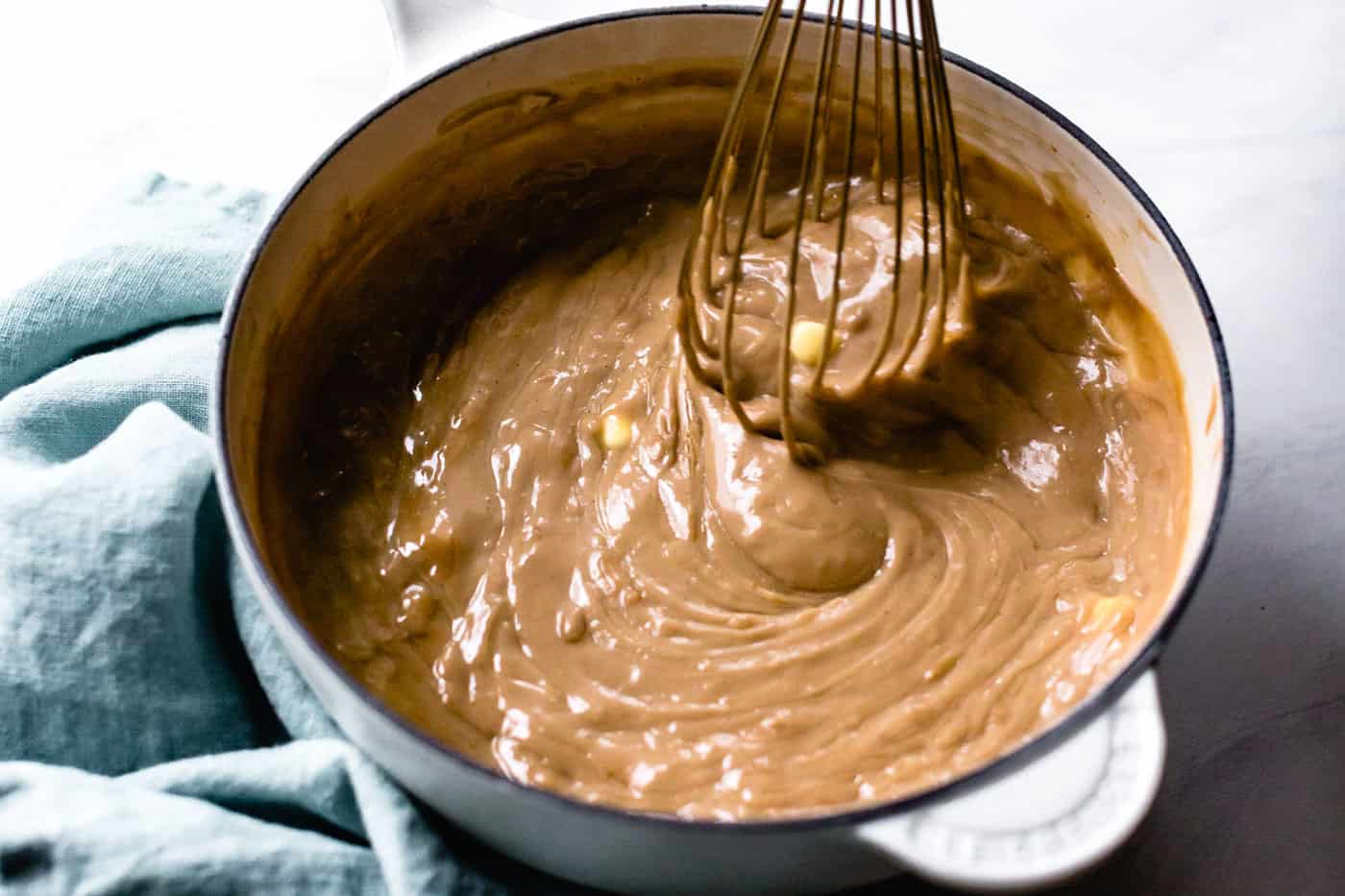 how to make pudding: whisking in butter