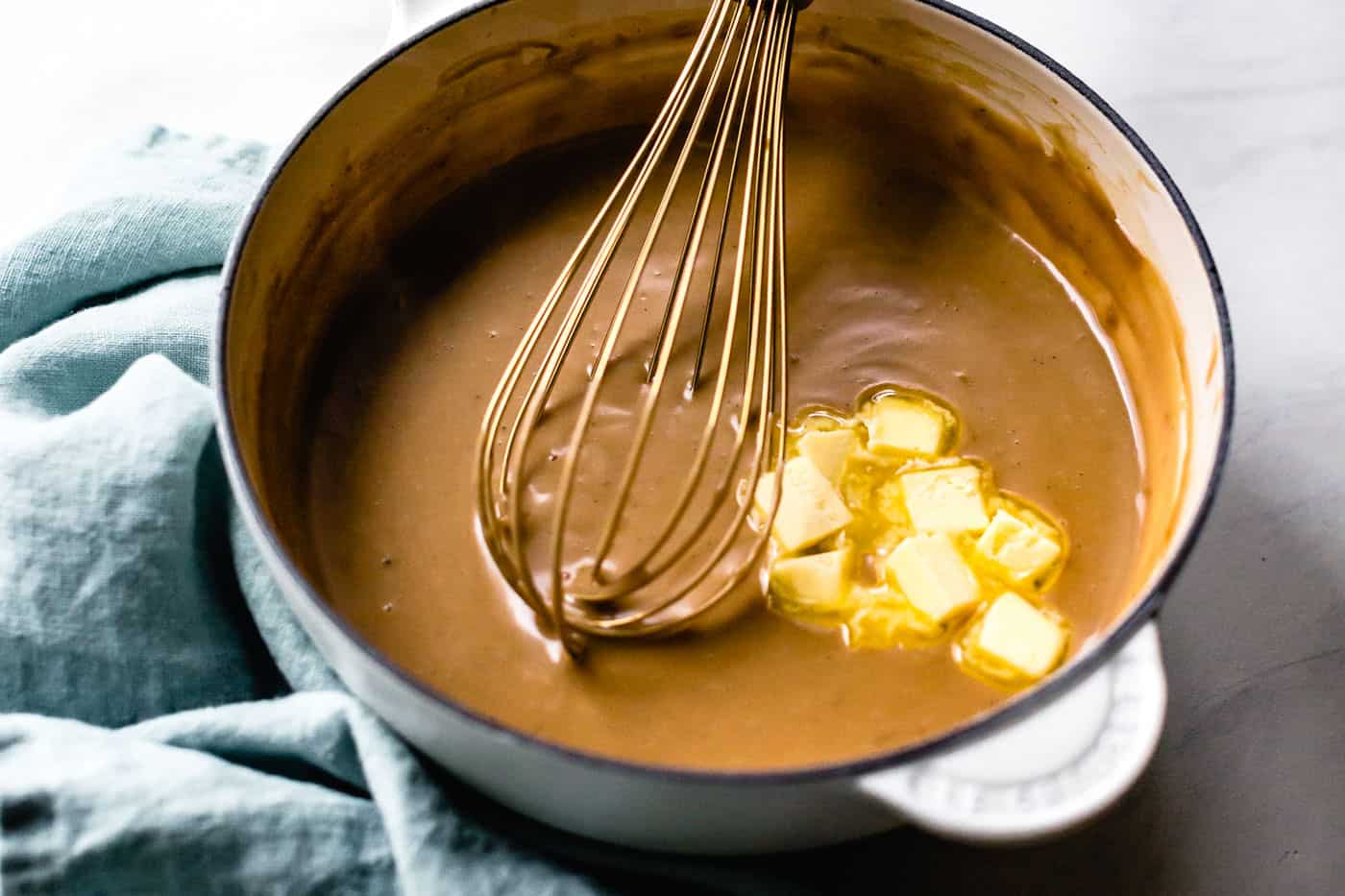 adding butter to butterscotch recipe