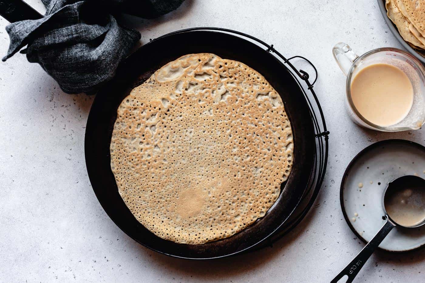 paleo crepes with almond flour cooked in a pan