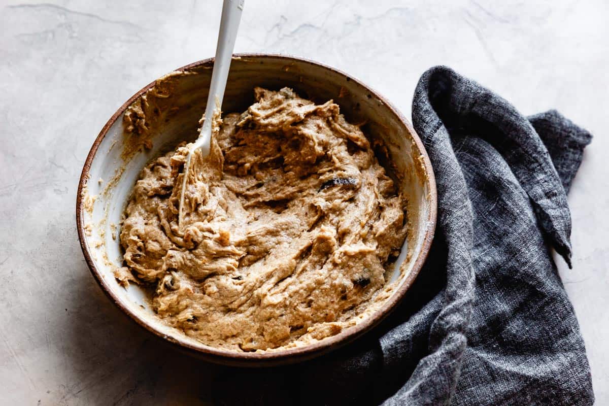 dates and walnuts mixed into batter