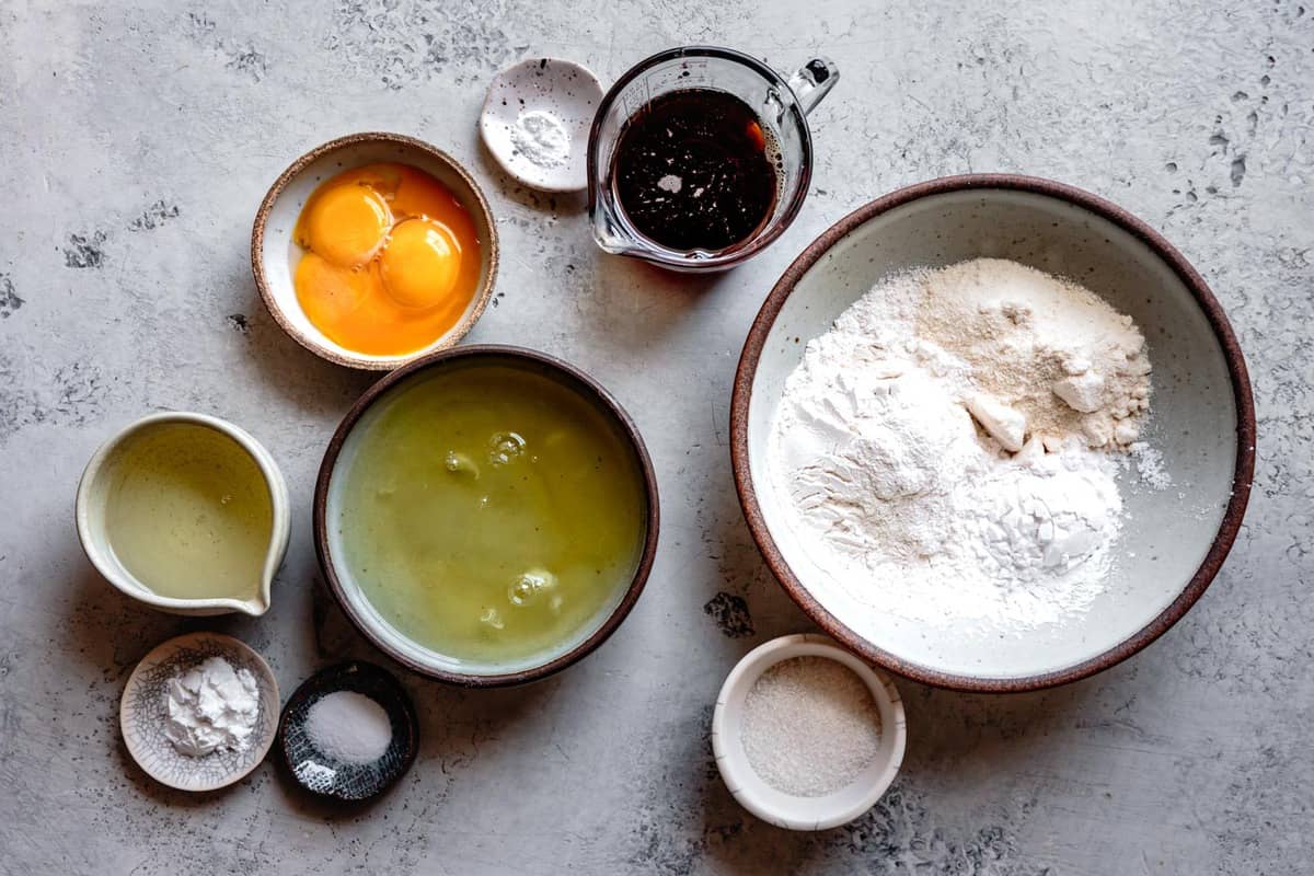 ingredients for gluten-free cake recipe on a stone surface