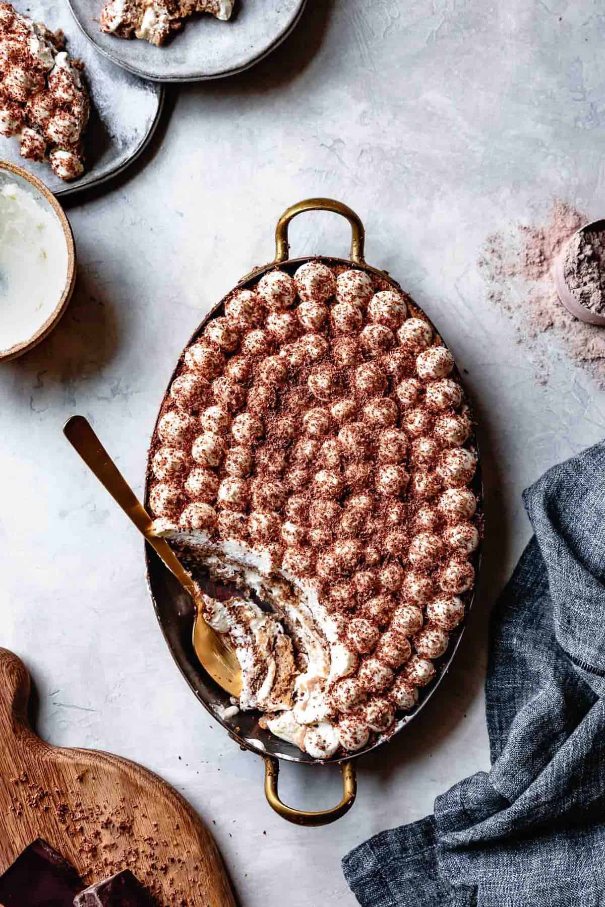 dish of gluten-free tiramisu recipe with some spooned out
