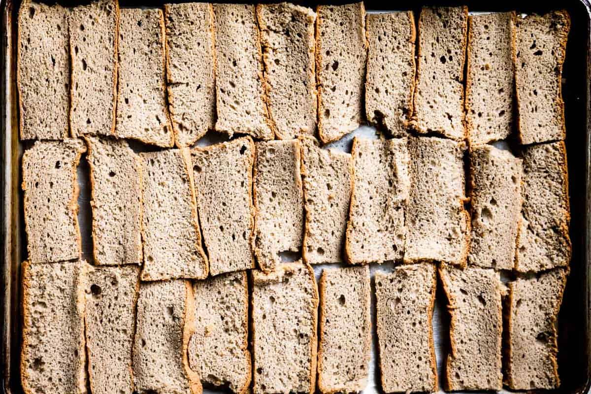 slices of sponge cake on a baking sheet